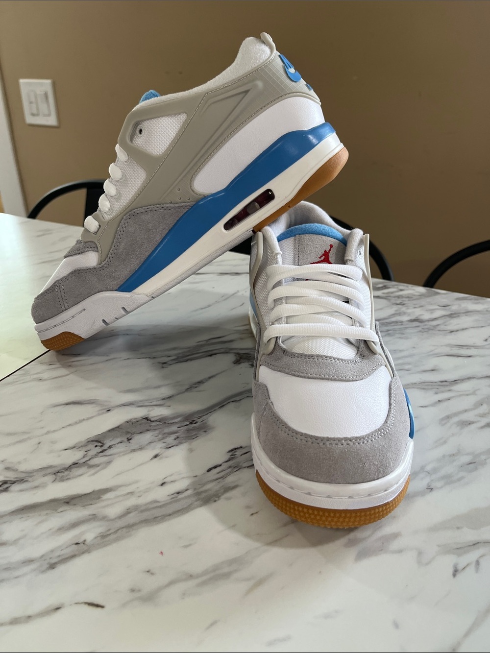 Jordan 4 RM Low-Top Sneakers in White, Gray, Blue